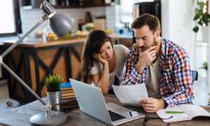 couple reading a radon test report